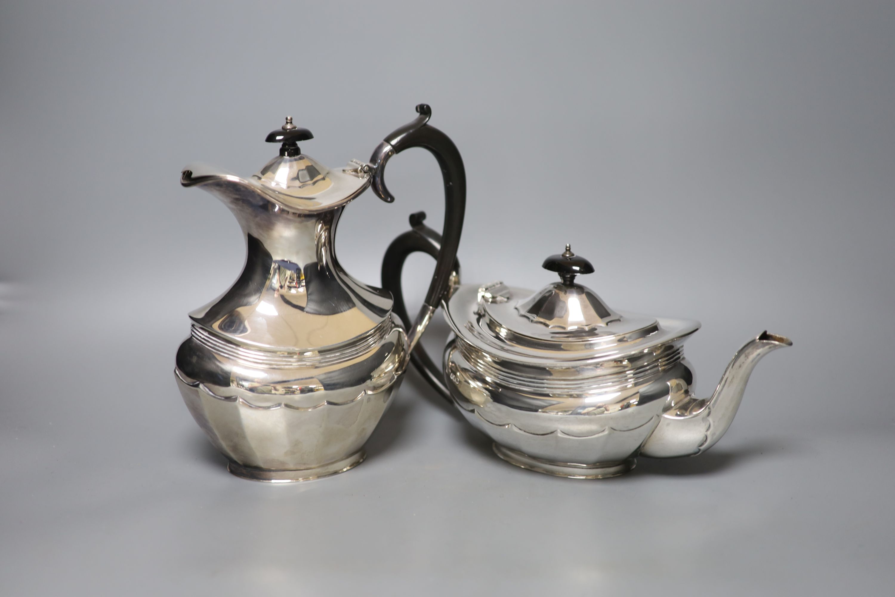 A George V silver four piece oval tea service, R.F. Mosley & Co, Sheffield, 1924 & 1931